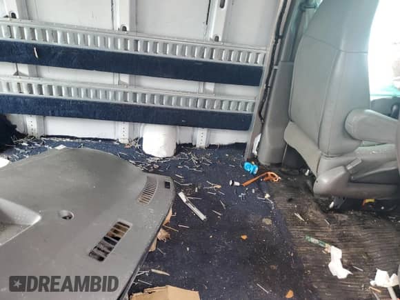 2018 Chevrolet Express Cargo с VIN 1GCWGAFP1J1282838, выставлен на аукционе Copart как лот 58350445 с пробегом Не указан миль и На запчасти • Non repairable. История ставок и продаж доступна на DreamBid. Изображение 11.