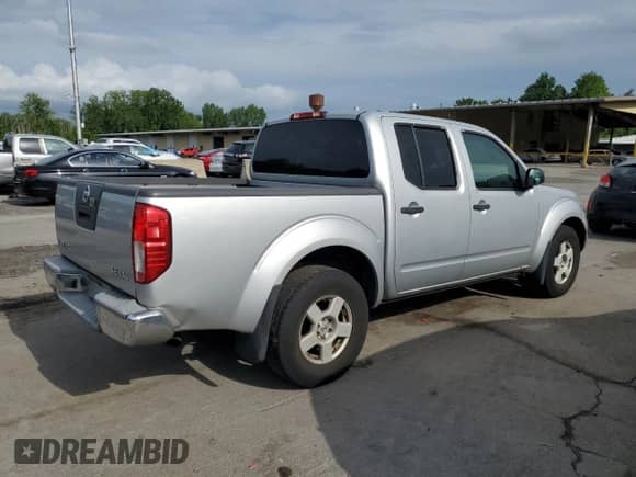 2005 Nissan Frontier LE с VIN 1N6AD07W75C465199, выставлен на аукционе Copart как лот 63860845 с пробегом 149 763 миль миль и Чистый • Clean title. История ставок и продаж доступна на DreamBid. Изображение 3.