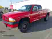 1999 Dodge Dakota SLT with VIN 1B7GG22XXXS290116, listed as a IAAI auction lot 41372636 with 132,112 mi miles and . Bid and sale history available at DreamBid. Image 2.