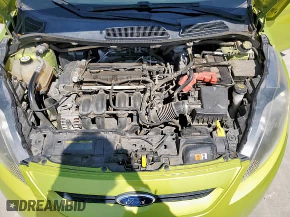 2012 Ford Fiesta SES with VIN 3FADP4FJ3CM111721, listed as a Copart auction lot 80182725 with 119,654 mi miles and Salvage title. Bid and sale history available at DreamBid. Image 12.