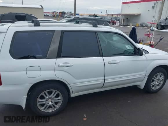 2005 Subaru Forester XT with VIN JF1SG69695H727201, listed as a IAAI auction lot 38577017 with 145,826 mi miles and . Bid and sale history available at DreamBid. Image 13.