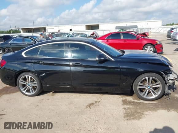 2018 BMW 4 Series 430i с VIN WBA4J1C5XJBM11792, выставлен на аукционе IAAI как лот 43166509 с пробегом 108 975 миль миль и . История ставок и продаж доступна на DreamBid. Изображение 14.