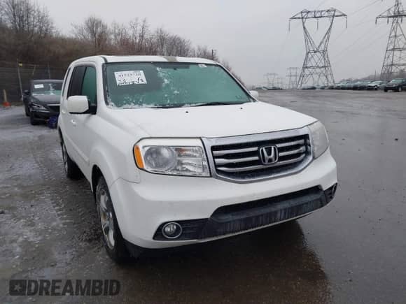 2014 Honda Pilot EX-L with VIN 5FNYF4H79EB024798, listed as a IAAI auction lot 41523720 with 149,717 mi miles and . Bid and sale history available at DreamBid. Image 6.