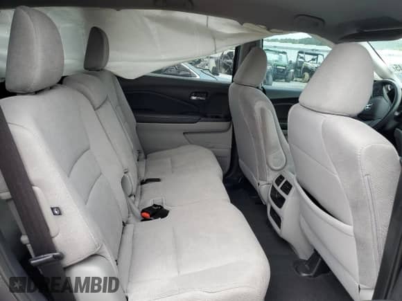 2019 Honda Pilot LX с VIN 5FNYF5H19KB028217, выставлен на аукционе Copart как лот 58665345 с пробегом Не указан миль и Списание • Salvage title. История ставок и продаж доступна на DreamBid. Изображение 11.