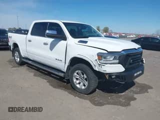 2020 Ram 1500 Laramie z VIN 1C6SRFRT5LN279572, wystawiony jako IAAI lot #41854832 z przebiegiem 105 128 mil mil oraz . Historia ofert i sprzedaży dostępna na DreamBid. Obrazek 1.