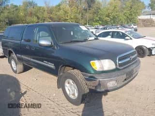 2001 Toyota Tundra SR5 z VIN 5TBBT441X1S159965, wystawiony jako IAAI lot #43363868 z przebiegiem 233 904 mil mil oraz . Historia ofert i sprzedaży dostępna na DreamBid. Obrazek 1.