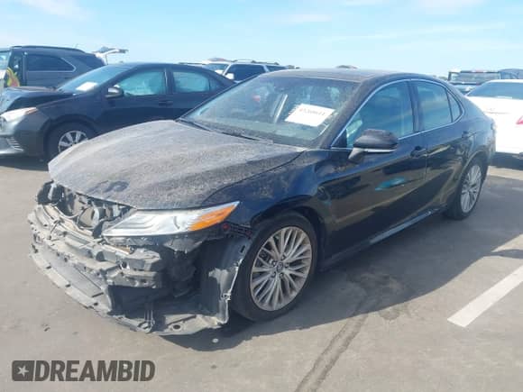 2019 Toyota Camry XSE z VIN 4T1BZ1HK1KU507488, wystawiony jako IAAI lot #43268611 z przebiegiem 128 395 mil mil oraz . Historia ofert i sprzedaży dostępna na DreamBid. Obrazek 2.