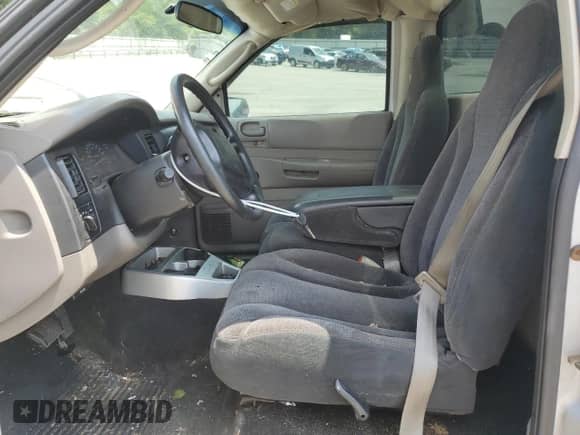 2002 Dodge Dakota z VIN 1B7FL16X12S692630, wystawiony jako Copart lot #66768875 z przebiegiem 135 930 mil mil oraz Szkoda całkowita • Salvage title. Historia ofert i sprzedaży dostępna na DreamBid. Obrazek 7.