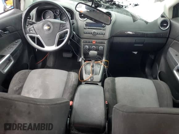 2014 Chevrolet Captiva Sport LS with VIN 3GNAL2EK4ES620861, listed as a Copart auction lot 54524015 with 142,389 mi miles and Salvage title. Bid and sale history available at DreamBid. Image 8.