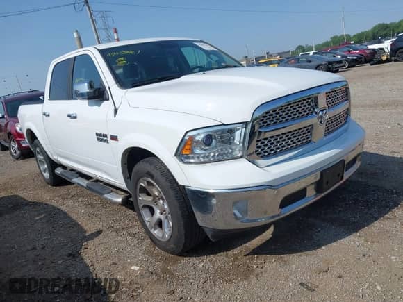 2018 Ram 1500 Laramie z VIN 1C6RR7NT0JS131161, wystawiony jako IAAI lot #42457461 z przebiegiem 89 410 mil mil oraz . Historia ofert i sprzedaży dostępna na DreamBid. Obrazek 1.