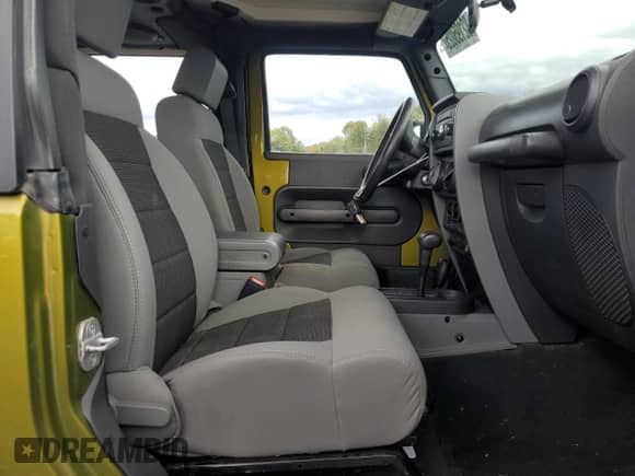 2008 Jeep Wrangler X z VIN 1J4FA241X8L512892, wystawiony jako Copart lot #82195025 z przebiegiem Nie podano mil oraz Czysty tytuł • Clean title. Historia ofert i sprzedaży dostępna na DreamBid. Obrazek 11.