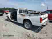 1991 Chevrolet S-10 z VIN 1GCCS14R2M8298189, wystawiony jako Copart lot #64741774 z przebiegiem 299 918 mil mil oraz Szkoda całkowita • Salvage title. Historia ofert i sprzedaży dostępna na DreamBid. Obrazek 2.