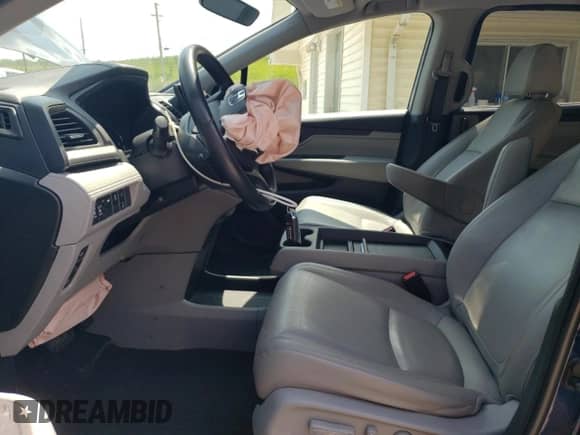 2019 Honda Odyssey EX-L with VIN 5FNRL6H79KB133458, listed as a Copart auction lot 60506915 with Not provided miles and Salvage title. Bid and sale history available at DreamBid. Image 7.