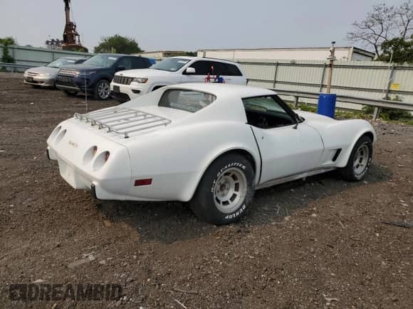 1977 Chevrolet Corvette with VIN 1Z37L7S405465, listed as a Copart auction lot 54827283 with Not provided miles and Salvage title. Bid and sale history available at DreamBid. Image 3.