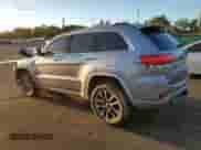 2017 Jeep Grand Cherokee Overland with VIN 1C4RJFCGXHC756588, listed as a Copart auction lot 84282675 with 101,960 mi miles and Salvage title. Bid and sale history available at DreamBid. Image 2.