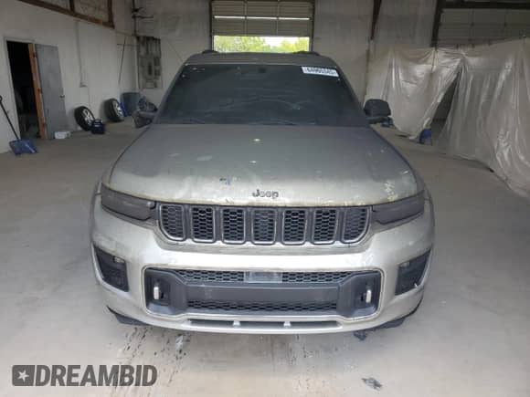 2021 Jeep Grand Cherokee Overland with VIN 1C4RJKDG8M8198082, listed as a Copart auction lot 64965345 with Not provided miles and Salvage title. Bid and sale history available at DreamBid. Image 5.