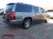 2011 Chevrolet Suburban LT z VIN 1GNSCJE09BR344091, wystawiony jako IAAI lot #41605909 z przebiegiem 312 559 mil mil oraz . Historia ofert i sprzedaży dostępna na DreamBid. Obrazek 4.