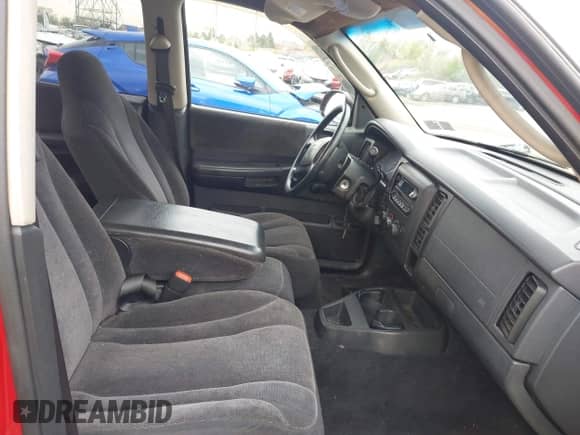 2003 Dodge Dakota Sport z VIN 1D7HG38X63S212434, wystawiony jako IAAI lot #42030739 z przebiegiem 181 098 mil mil oraz . Historia ofert i sprzedaży dostępna na DreamBid. Obrazek 5.