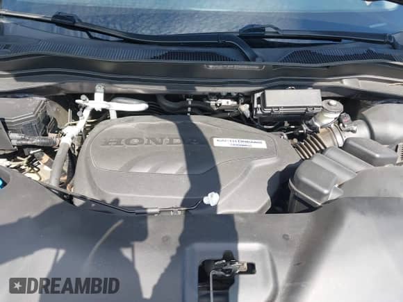 2019 Honda Pilot Touring 8-Passenger z VIN 5FNYF5H95KB010979, wystawiony jako IAAI lot #43285702 z przebiegiem 147 812 mil mil oraz . Historia ofert i sprzedaży dostępna na DreamBid. Obrazek 10.