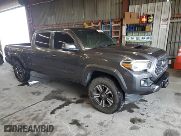 2019 Toyota Tacoma SR5 with VIN 3TMBZ5DN4KM020320, listed as a Copart auction lot 86659885 with 160,767 mi miles and Salvage title. Bid and sale history available at DreamBid. Image 4.