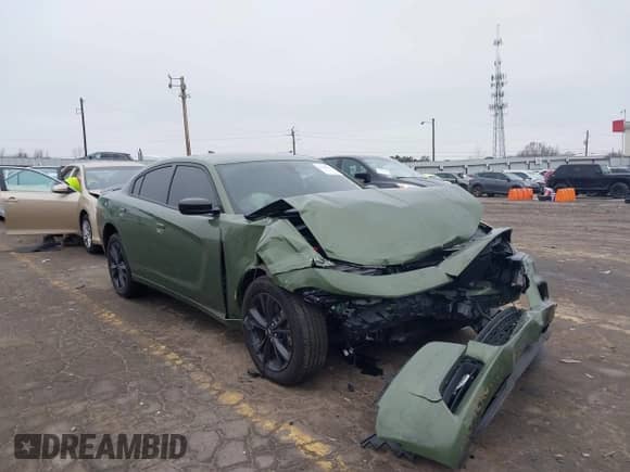 2023 Dodge Charger SXT with VIN 2C3CDXJG1PH657695, listed as a IAAI auction lot 41199974 with 26,013 mi miles and . Bid and sale history available at DreamBid. Image 1.