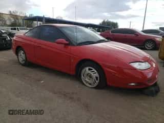 2001 Saturn SC with VIN 1G8ZY12701Z201761, listed as a Copart auction lot 76792804 with 85,352 mi miles and Salvage title. Bid and sale history available at DreamBid. Image 4.