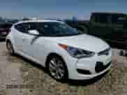 2016 Hyundai Veloster z VIN KMHTC6AD7GU287344, wystawiony jako Copart lot #61556995 z przebiegiem 92 715 mil mil oraz Szkoda całkowita • Salvage title. Historia ofert i sprzedaży dostępna na DreamBid. Obrazek 14.