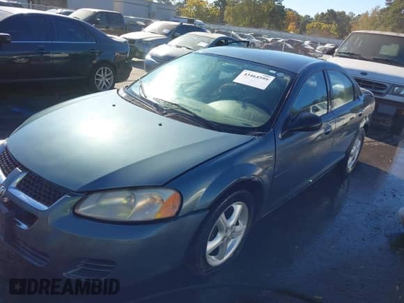 2006 Dodge Stratus SXT with VIN 1B3EL46X96N278885, listed as a IAAI auction lot 43464599 with 210,357 mi miles and . Bid and sale history available at DreamBid. Image 2.