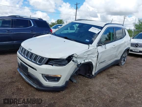 2019 Jeep Compass Limited with VIN 3C4NJDCB0KT747725, listed as a IAAI auction lot 43251726 with 97,576 mi miles and . Bid and sale history available at DreamBid. Image 2.