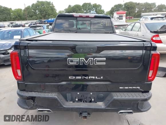 2020 GMC Sierra 1500 Denali with VIN 3GTU9FEL7LG370858, listed as a IAAI auction lot 42574907 with 27,005 mi miles and . Bid and sale history available at DreamBid. Image 16.