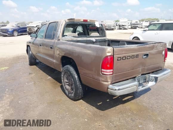 2001 Dodge Dakota Sport with VIN 1B7GL2AN71S217191, listed as a IAAI auction lot 43326836 with 294,901 mi miles and . Bid and sale history available at DreamBid. Image 3.