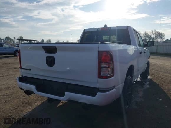 2023 Ram 1500 Lone Star z VIN 1C6RREBT8PN553095, wystawiony jako IAAI lot #41647688 z przebiegiem 18 574 mil mil oraz . Historia ofert i sprzedaży dostępna na DreamBid. Obrazek 4.