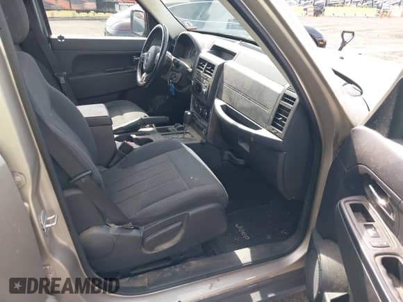 2011 Jeep Liberty Sport with VIN 1J4PN2GK4BW593858, listed as a IAAI auction lot 43331397 with 130,728 mi miles and . Bid and sale history available at DreamBid. Image 5.