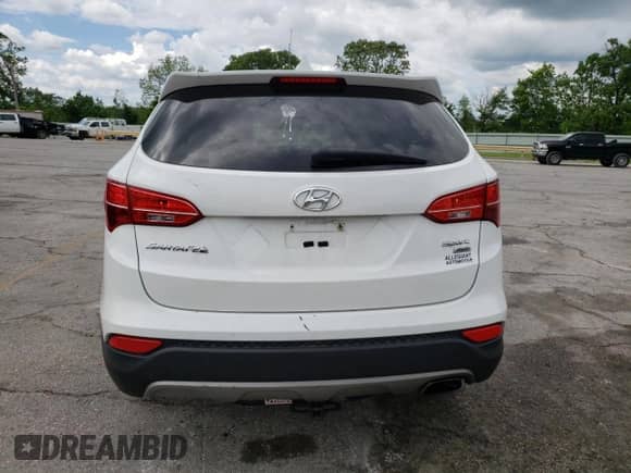 2015 Hyundai Santa Fe with VIN 5XYZTDLB5FG299989, listed as a Copart auction lot 56715015 with 139,001 mi miles and Clean title. Bid and sale history available at DreamBid. Image 6.
