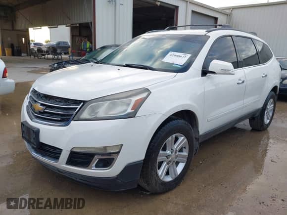 2014 Chevrolet Traverse LT z VIN 1GNKRHKD0EJ293923, wystawiony jako IAAI lot #42900872 z przebiegiem 179 018 mil mil oraz . Historia ofert i sprzedaży dostępna na DreamBid. Obrazek 18.