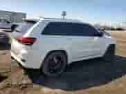 2016 Jeep Grand Cherokee SRT z VIN 1C4RJFDJ2GC441079, wystawiony jako Copart lot #48360525 z przebiegiem 61 152 mil mil oraz Szkoda całkowita • Salvage title. Historia ofert i sprzedaży dostępna na DreamBid. Obrazek 3.