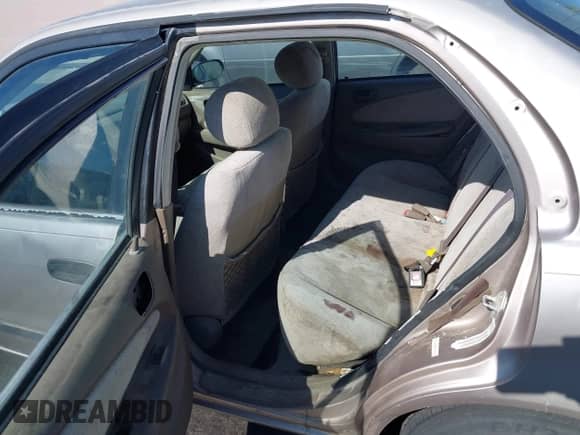 1998 Chevrolet Prizm Lsi z VIN 1Y1SK5288WZ410595, wystawiony jako IAAI lot #42159012 z przebiegiem 181 762 mil mil oraz . Historia ofert i sprzedaży dostępna na DreamBid. Obrazek 8.