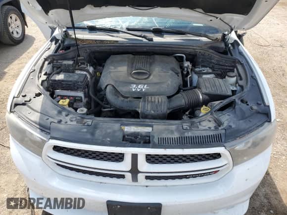 2013 Dodge Durango SXT with VIN 1C4RDJAG7DC575200, listed as a Copart auction lot 69939075 with 214,641 mi miles and Clean title. Bid and sale history available at DreamBid. Image 12.