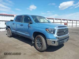 2021 Toyota Tundra SR5 z VIN 5TFDY5F11MX992122, wystawiony jako IAAI lot #43020879 z przebiegiem 49 549 mil mil oraz . Historia ofert i sprzedaży dostępna na DreamBid. Obrazek 1.