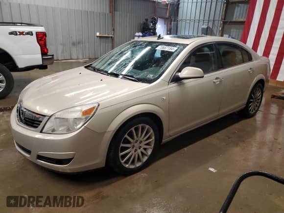 2009 Saturn Aura XR with VIN 1G8ZX57739F192831, listed as a Copart auction lot 73667154 with 96,845 mi miles and Salvage title. Bid and sale history available at DreamBid. Image 1.