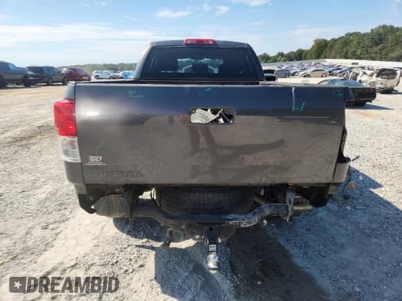 2012 Toyota Tundra z VIN 5TFRY5F13CX123560, wystawiony jako Copart lot #71097505 z przebiegiem 190 171 mil mil oraz Szkoda całkowita • Salvage title. Historia ofert i sprzedaży dostępna na DreamBid. Obrazek 6.