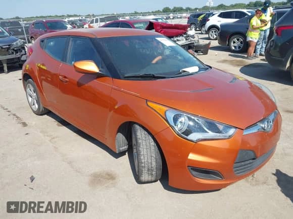 2013 Hyundai Veloster w/Black Int z VIN KMHTC6AD9DU086699, wystawiony jako IAAI lot #43352014 z przebiegiem 191 232 mil mil oraz . Historia ofert i sprzedaży dostępna na DreamBid. Obrazek 1.