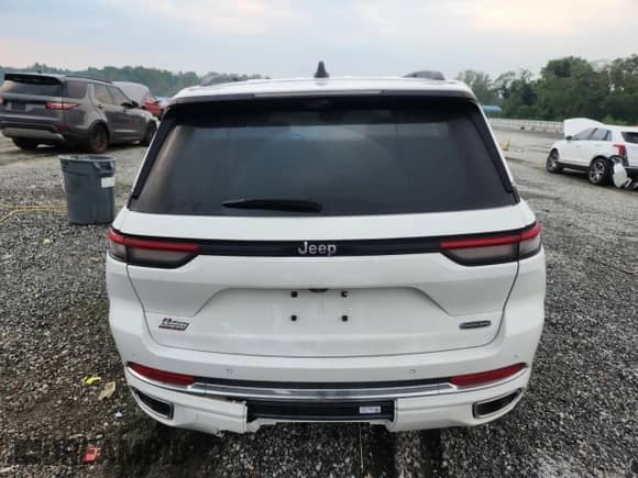 2023 Jeep Grand Cherokee Overland z VIN 1C4RJGDG2PC571101, wystawiony jako Copart lot #71158185 z przebiegiem 17 358 mil mil oraz Szkoda całkowita • Salvage title. Historia ofert i sprzedaży dostępna na DreamBid. Obrazek 6.