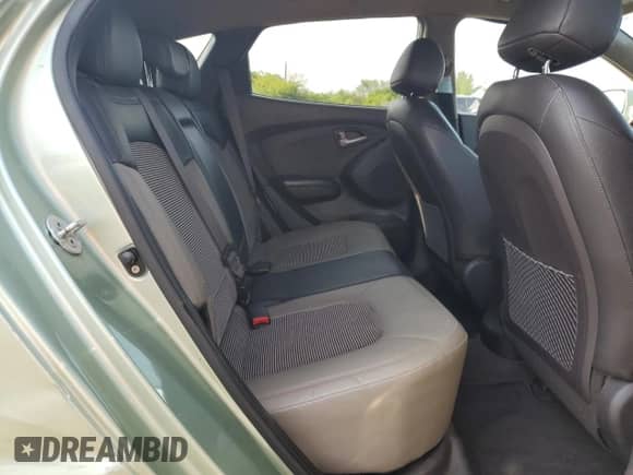 2011 Hyundai Tucson Limited with VIN KM8JUCAC5BU143200, listed as a Copart auction lot 59398055 with 217,552 mi miles and Clean title. Bid and sale history available at DreamBid. Image 11.