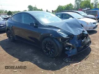 2022 Tesla Model Y Long Range z VIN 7SAYGDEE8NF434074, wystawiony jako IAAI lot #42522198 z przebiegiem 37 469 mil mil oraz . Historia ofert i sprzedaży dostępna na DreamBid. Obrazek 1.