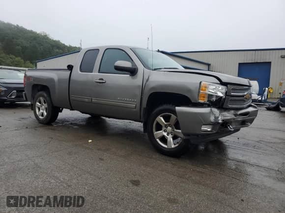 2012 Chevrolet Silverado 1500 LT с VIN 1GCRKSE75CZ245511, выставлен на аукционе Copart как лот 83821925 с пробегом 108 219 миль миль и Списание • Salvage title. История ставок и продаж доступна на DreamBid. Изображение 4.