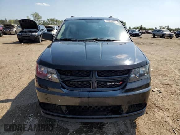 2017 Dodge Journey SE z VIN 3C4PDCAB9HT706029, wystawiony jako Copart lot #80097385 z przebiegiem 138 939 mil mil oraz Szkoda całkowita • Salvage title. Historia ofert i sprzedaży dostępna na DreamBid. Obrazek 5.