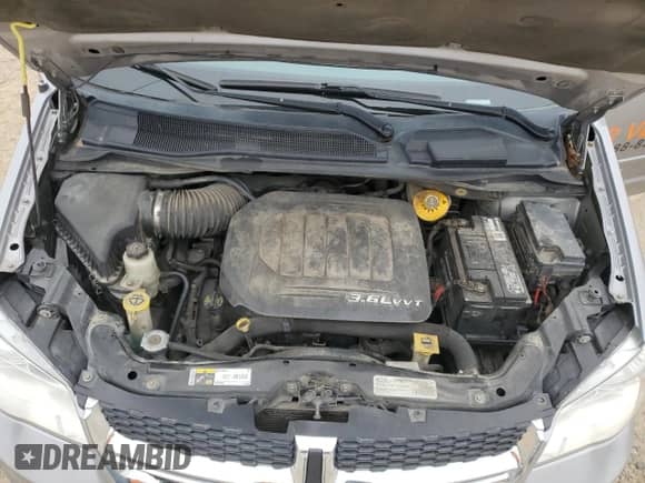 2016 Dodge Grand Caravan American Value with VIN 2C4RDGBG2GR219573, listed as a Copart auction lot 48353045 with 328,933 mi miles and Salvage title. Bid and sale history available at DreamBid. Image 12.