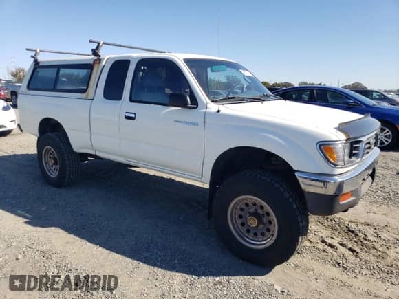 1997 Toyota Tacoma with VIN 4TAWN72N1VZ242680, listed as a Copart auction lot 85537735 with 218,563 mi miles and Clean title. Bid and sale history available at DreamBid. Image 4.