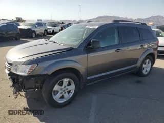 2018 Dodge Journey SE with VIN 3C4PDCABXJT375709, listed as a Copart auction lot 85906354 with 104,489 mi miles and Non repairable. Bid and sale history available at DreamBid. Image 1.
